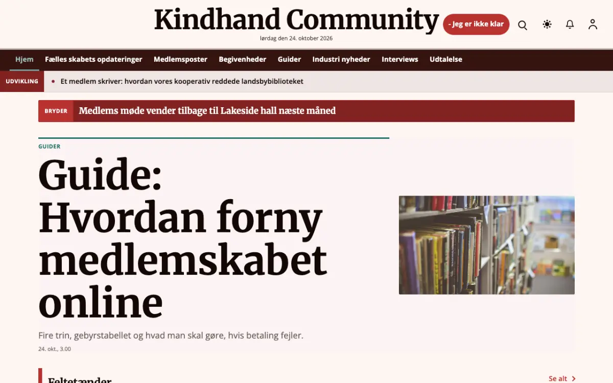 Kindhand – hjemmesideskabelon til Fællesskab News, skrivebordsvisning